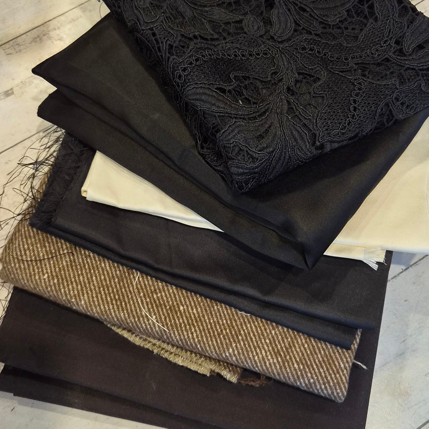 6. 6 pieces assorted guipure lace, taffeta, suiting, satin and coating