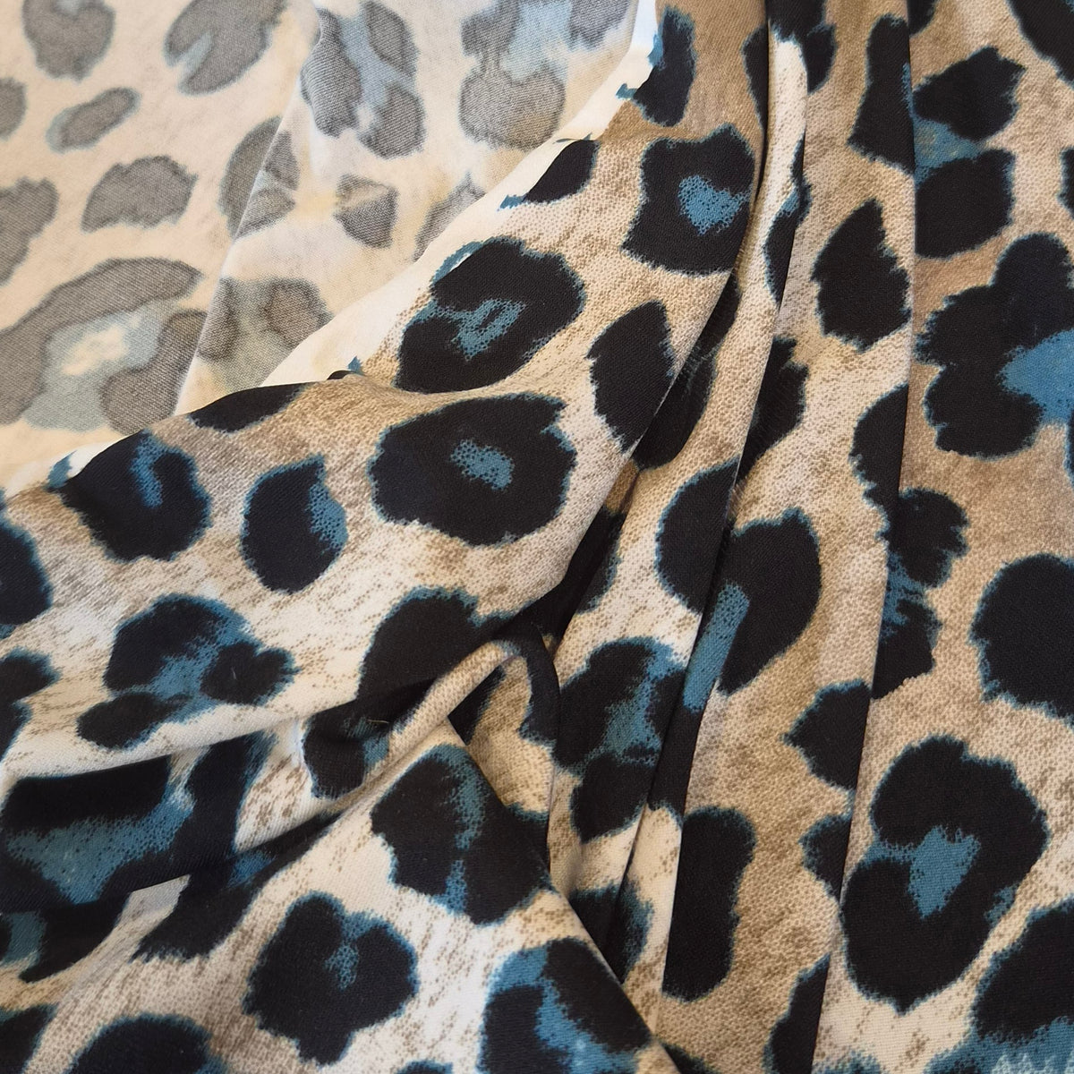 Teal leopard jersey knit