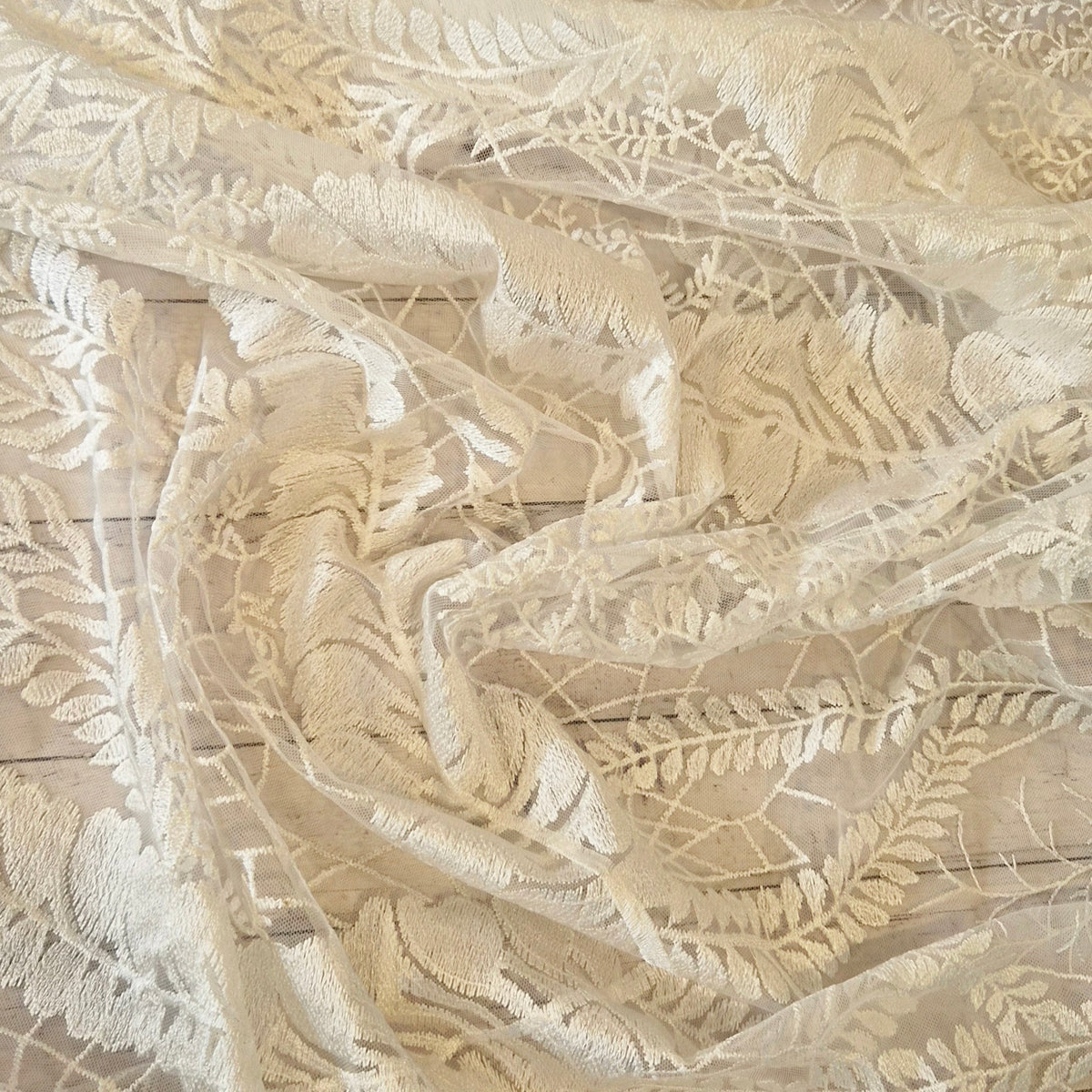 Ivory leaves and vines lace