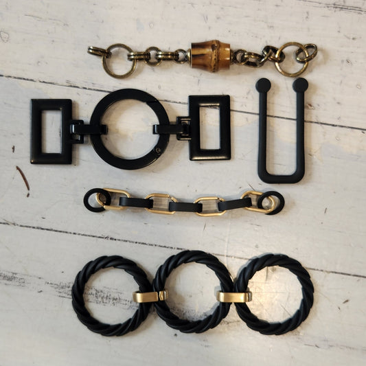 16. Collection of metal embellishments