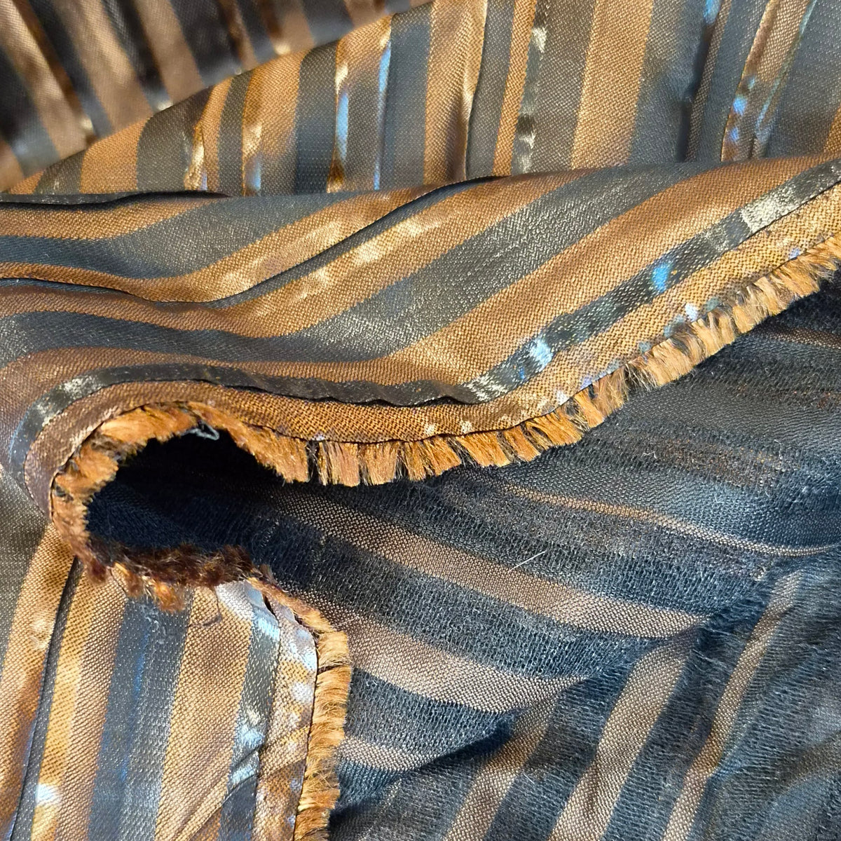 Rich Brown pleated suiting