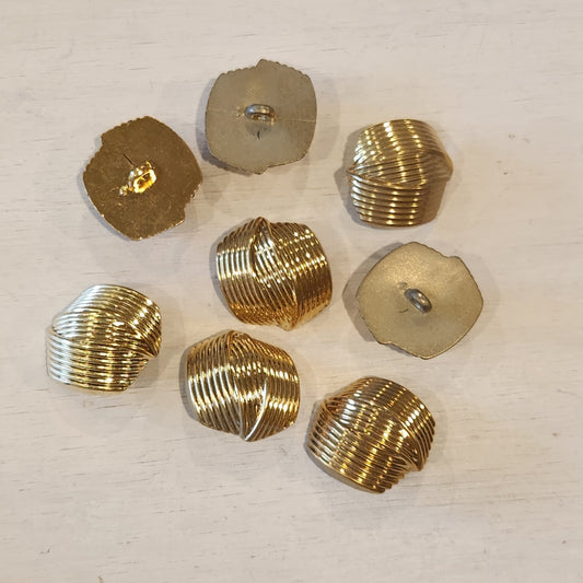 Armour gold button