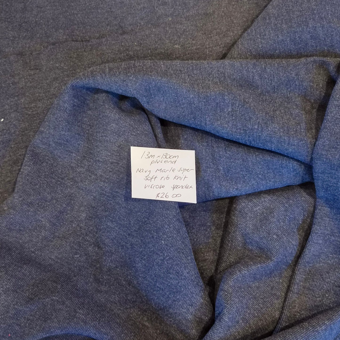 1.3m plus end Navy marle super soft ribbed knit