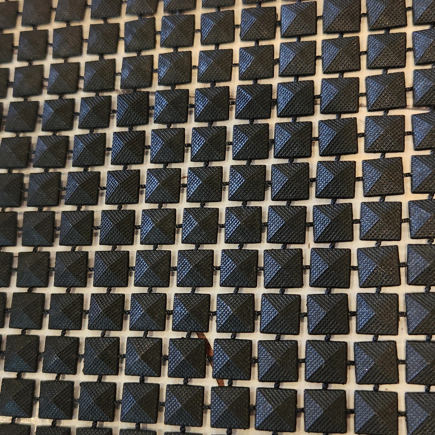 Black pyramid plastic trim