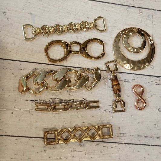 19. Collection of metal embellishments
