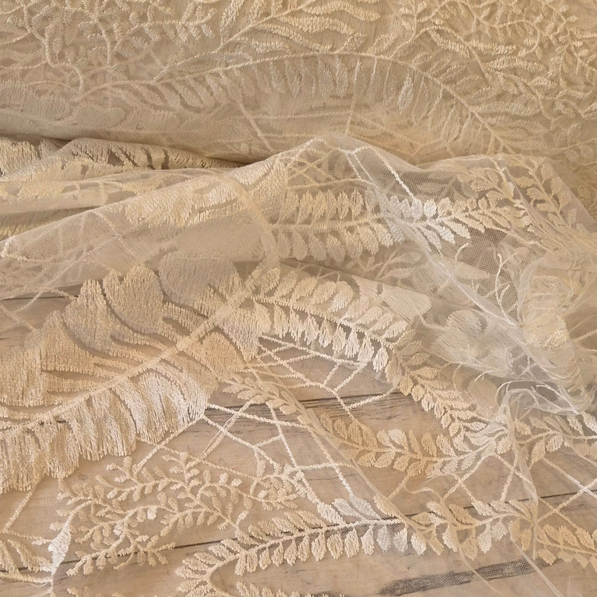 Ivory leaves and vines lace