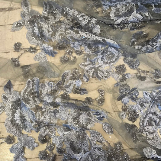 Shimmering silver embroidered lace