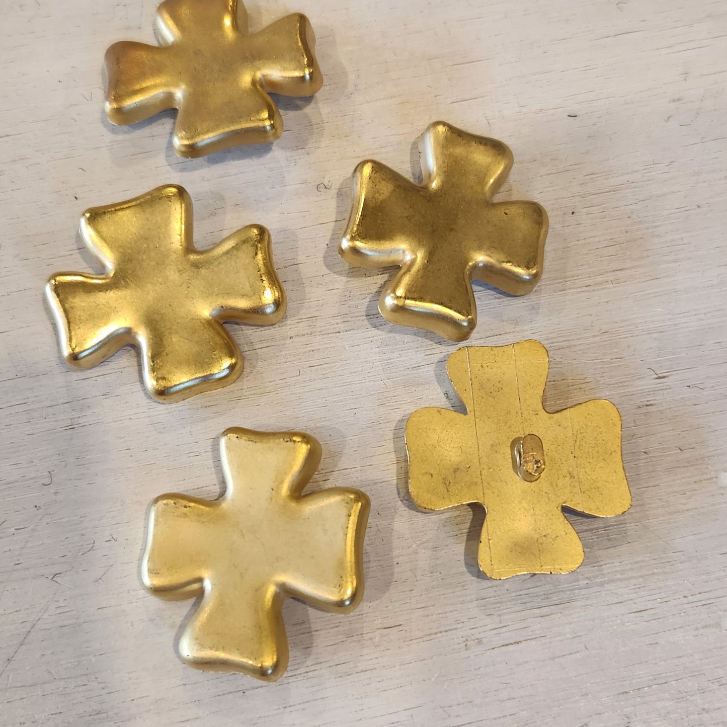 Cross matt gold button