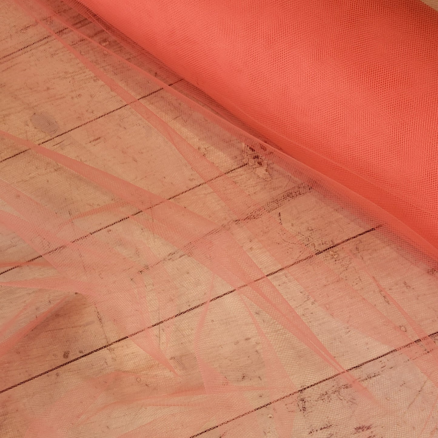 Coral fine textured tulle