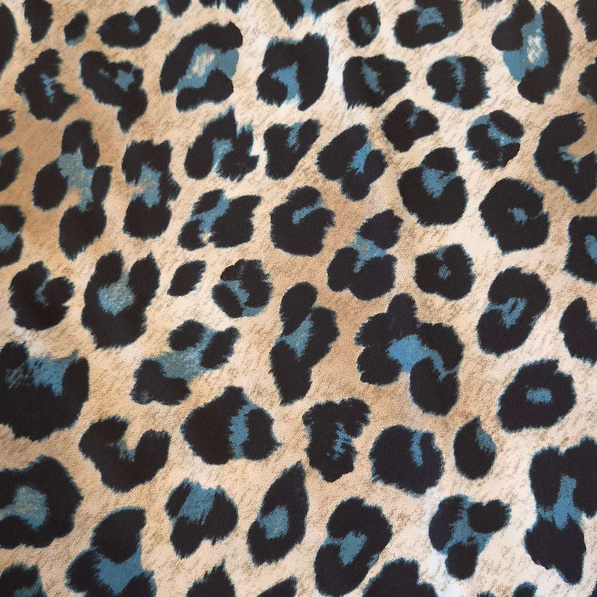 Teal leopard jersey knit