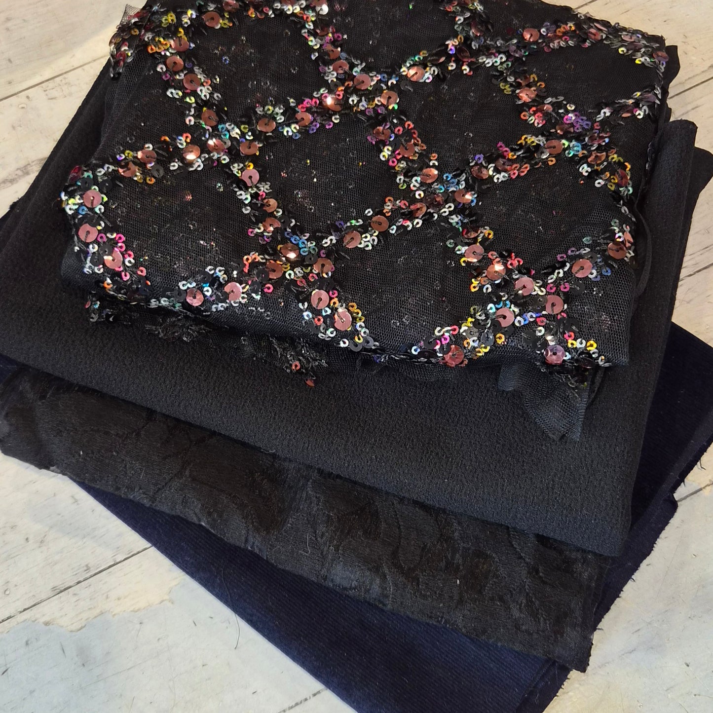 136. 4 pieces sequin mesh, bonded crepe, corduroy and jacquard organza
